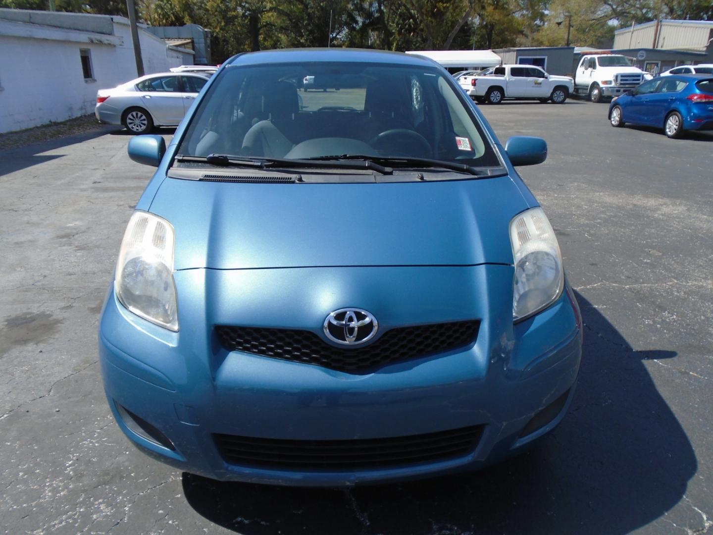 2010 BLUE /Grey Toyota Yaris Liftback 5-Door AT (JTDKT4K39A5) with an 1.5L L4 DOHC 16V engine, 4-Speed Automatic transmission, located at 6112 N Florida Avenue, Tampa, FL, 33604, (888) 521-5131, 27.954929, -82.459534 - Photo#1